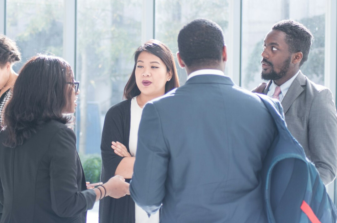 diverse people discussing